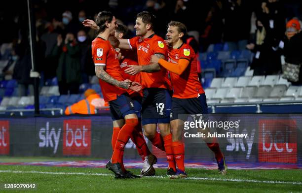 James Collins of Luton Town celebrates after scoring their sides third goal with Kiernan Dewsbury-Hall of Luton Town during the Sky Bet Championship...
