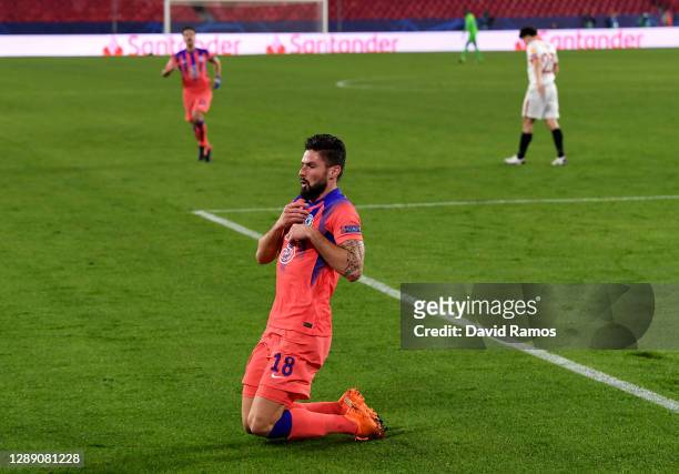 Olivier Giroud of Chelsea celebrates after scoring their sides second goal during the UEFA Champions League Group E stage match between FC Sevilla...