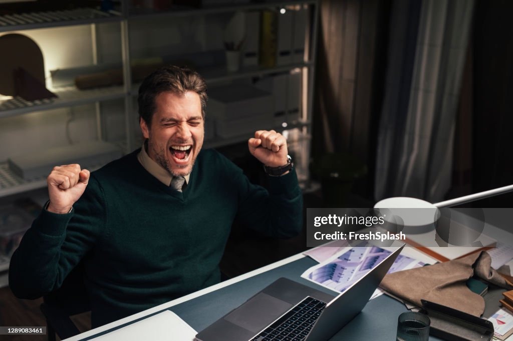 Handsome Young Programmer Celebrating After Finally Running His Code ...