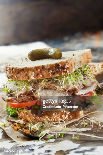 roast pork sandwich with lettuce, tomato, micro greens and grainy mustard - dijon mustard stock pictures, royalty-free photos & images