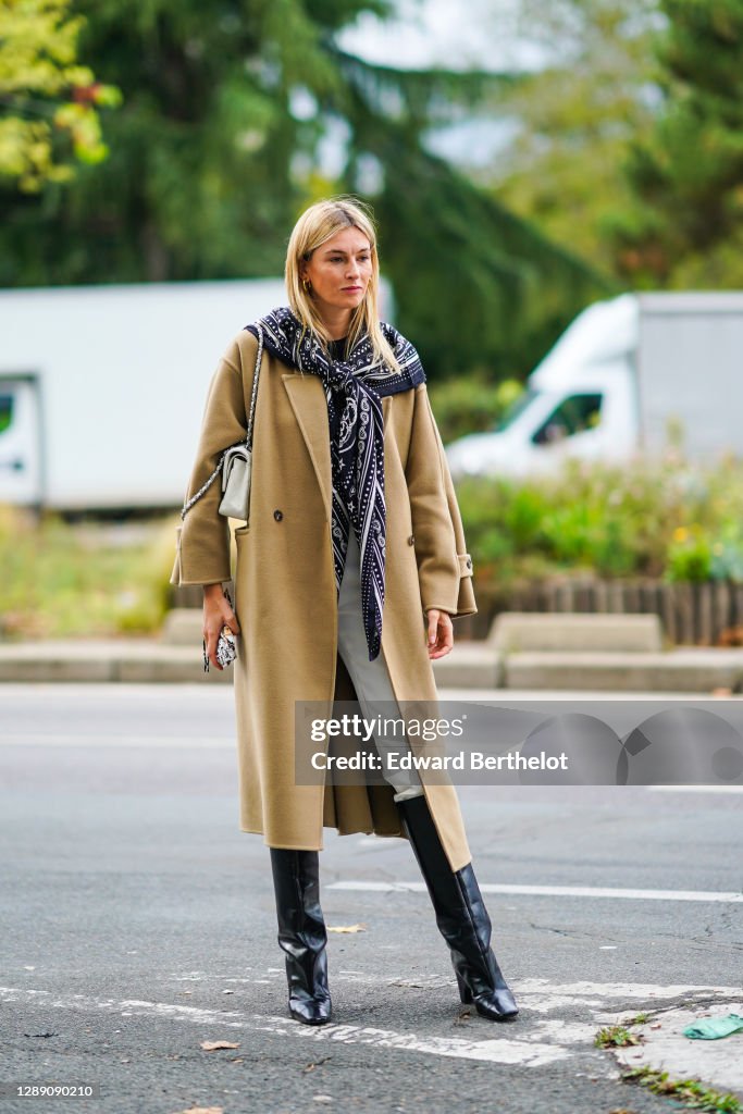 Camille Charriere wears a long scarf, a beige long wool coat, a bag,  News Photo - Getty Images