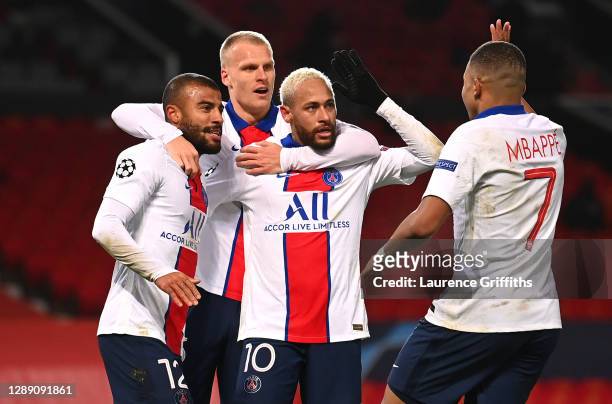 Neymar of Paris Saint-Germain celebrates with team mates Rafinha ,Mitchel Bakker and Kylian Mbappe after scoring their sides third goal during the...