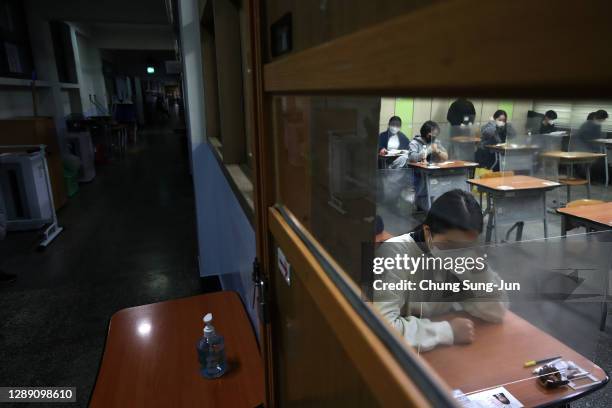 South Korean students take their College Scholastic Ability Test at a school amid the coronavirus pandemic on December 03, 2020 in Seoul, South...