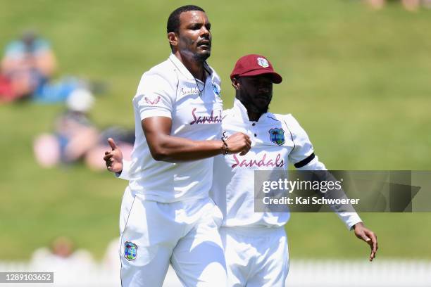 Shannon Gabriel of the West Indies is congratulated by team mates after dismissing Will Young of New Zealand during day one of the First Test match...