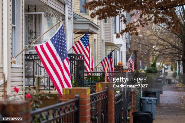 kensington brooklyn houses with american flags - american flag house stock pictures, royalty-free photos & images