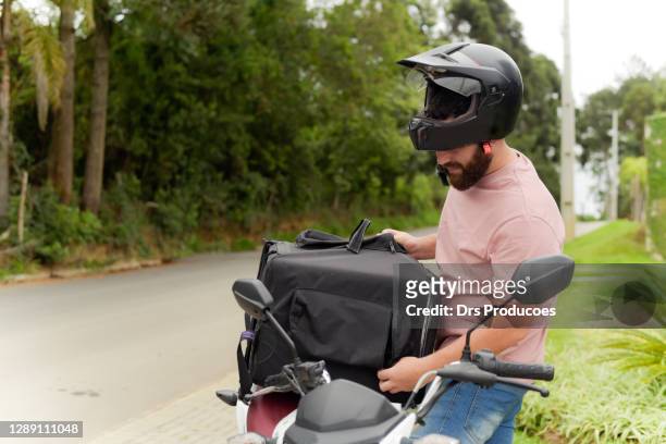 motoboy, parcel delivery - motoboy stock pictures, royalty-free photos & images