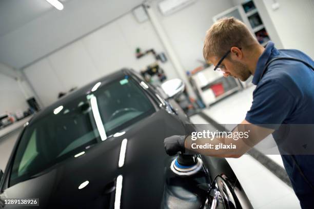 car polishing service. - shiny paint stock pictures, royalty-free photos & images