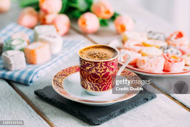 turkish coffee served with colorful turkish delight - turkish delight stock pictures, royalty-free photos & images