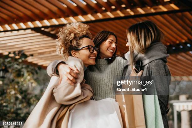 girls spending a day in shopping - shopping fun stock pictures, royalty-free photos & images