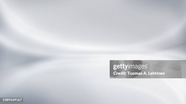 abstract and modern gray background with brighter blurred curved lines. - plain grey backgrounds stock pictures, royalty-free photos & images