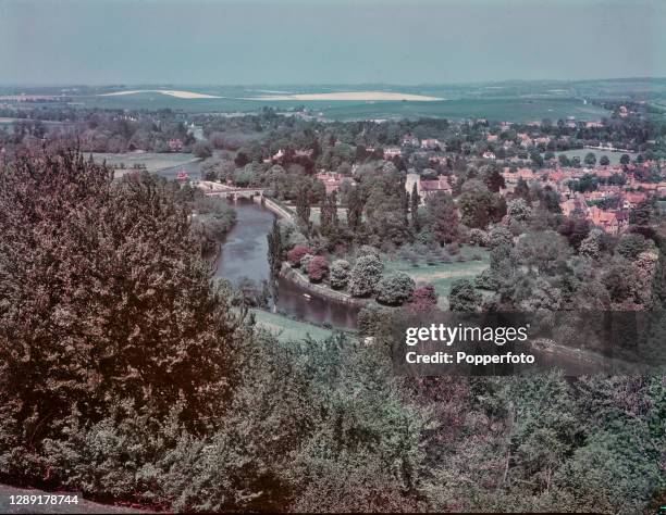 View from the Berkshire Downs above Streatley of the River Thames flowing through the Goring Gap with the village of Goring-on-Thames in South...