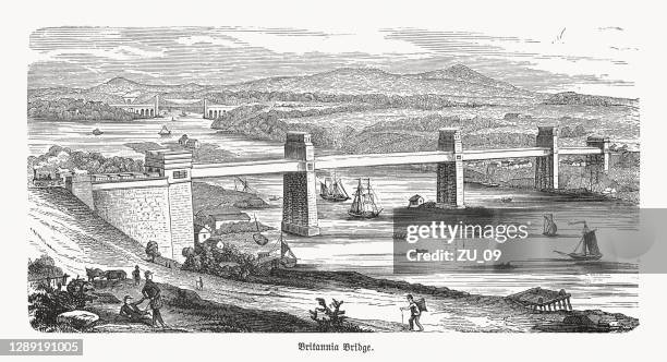 historical view of the britannia bridge, wales, uk, woodcut, 1893 - bangor wales stock illustrations