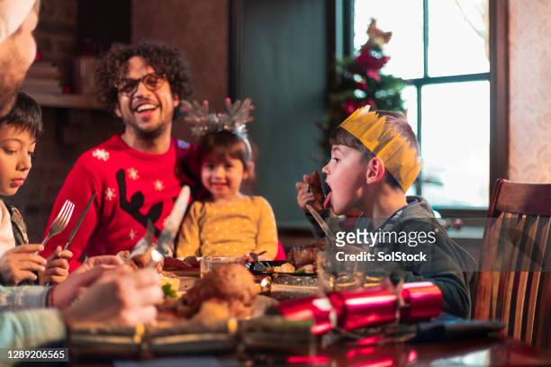 christmas dinner with the family - cosy pub stock pictures, royalty-free photos & images