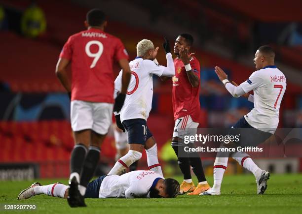 Fred of Manchester United argues with Neymar of Paris Saint-Germain after a 'head butt' incident with Leandro Paredes during the UEFA Champions...