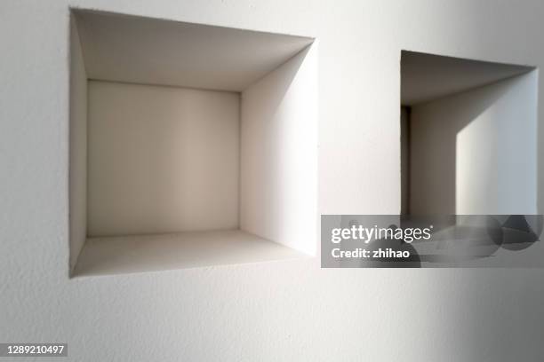 two squares with sunlight effect - aushöhlung stock-fotos und bilder