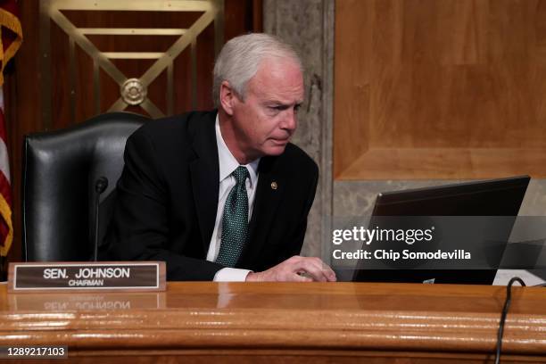 Senate Homeland Security Committee Chairman Ron Johnson attempts to communicate with journalist Sharyl Attkisson before a hearing about the Crossfire...