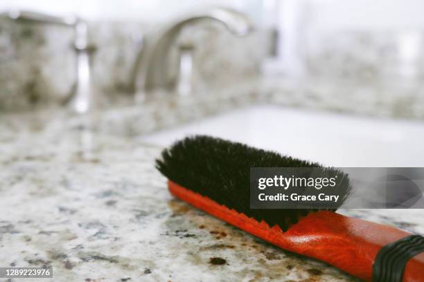 boar bristle hair brush on bathroom counter - bristle stock pictures, royalty-free photos & images