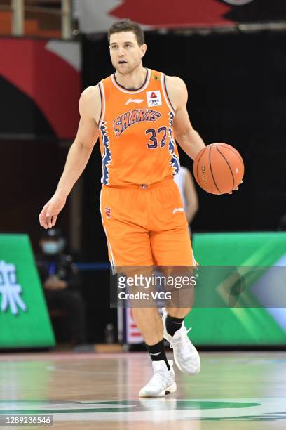 Jimmer Fredette of Shanghai Sharks drives the ball during 2020/2021 Chinese Basketball Association League match between Sichuan Blue Whales and...