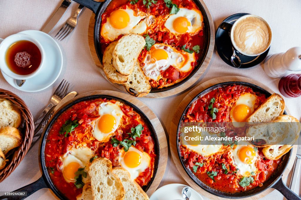 Shakshuka served in frying pan, directly above view