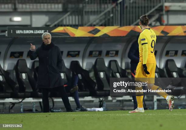 Jose Mourinho, Manager of Tottenham Hotspur speaks to Gareth Bale of Tottenham Hotspur after he is subbed during the UEFA Europa League Group J stage...