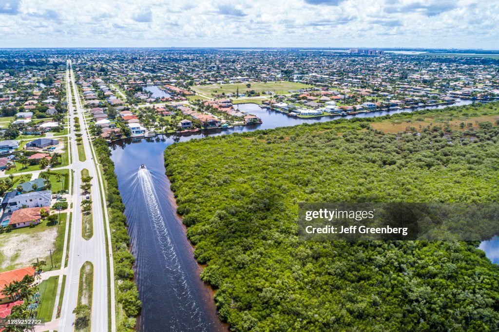 Florida, Cape Coral, South Spreader Waterway Canal, aquatic nature preserve and surrounding homes
