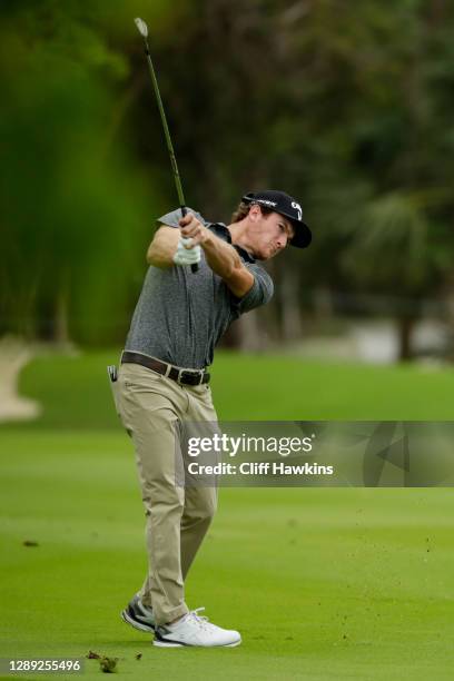 Drew Nesbitt of Canada plays a shot on the ninth hole during the first round of the Mayakoba Golf Classic at El Camaleón Golf Club on December 03,...