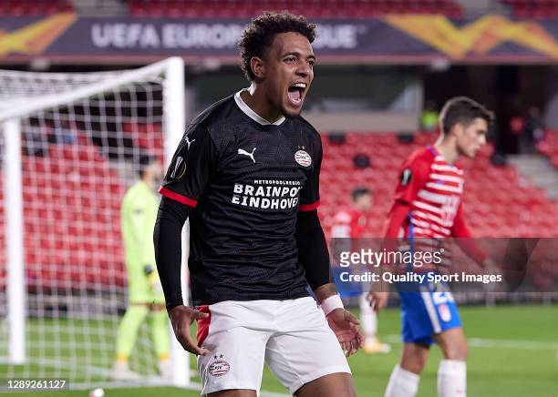 Donyell Malen of PSV Eindhoven celebrates after scoring his team's first goal during the UEFA Europa League Group E stage match between Granada CF...