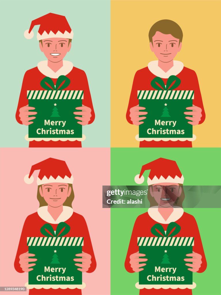 Smiling beautiful children (boys and girls) dressed in a Santa Claus suit holding a Christmas present gift box