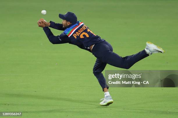 Manish Pandey of India drops D'Arcy Short of Australia during game one of the Twenty20 International series between Australia and India at Manuka...