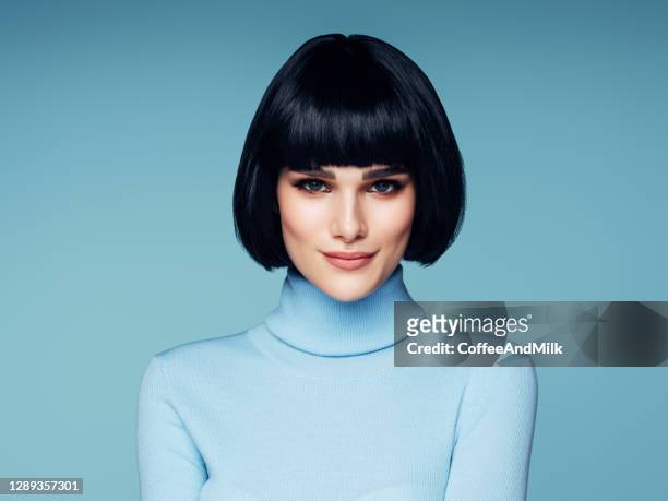 beautiful woman with black short hair - black hair wig stock pictures, royalty-free photos & images