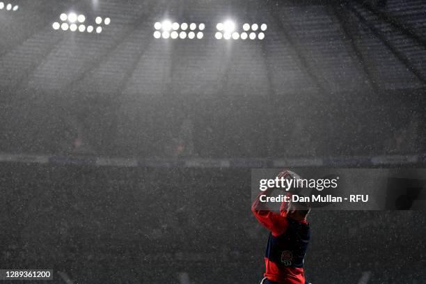 Luke Cowan-Dickie of England throws in at a lineout during a training session at Twickenham Stadium on December 03, 2020 in London, England.