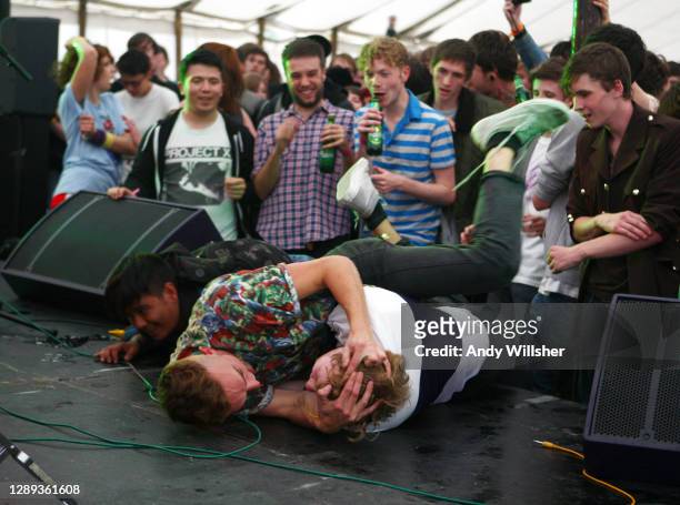 Fans on stage as Indie guitar band Male Bonding performing at Offset Festival in 2009