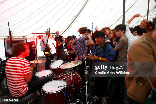 Fans on stage as Indie guitar band Male Bonding performing at Offset Festival in 2009