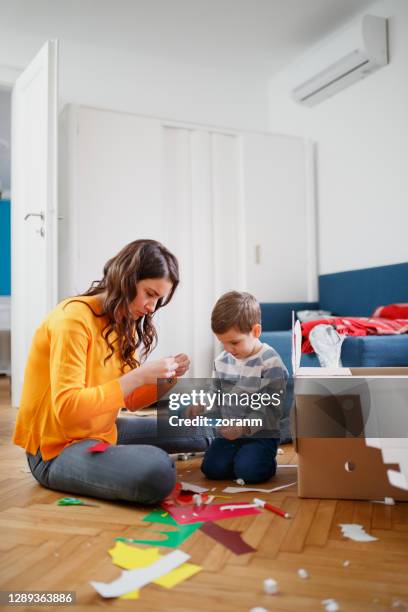Making A Mess 138 Kids Making Mess On Floor Stock Photos, High-Res Pictures, and ...