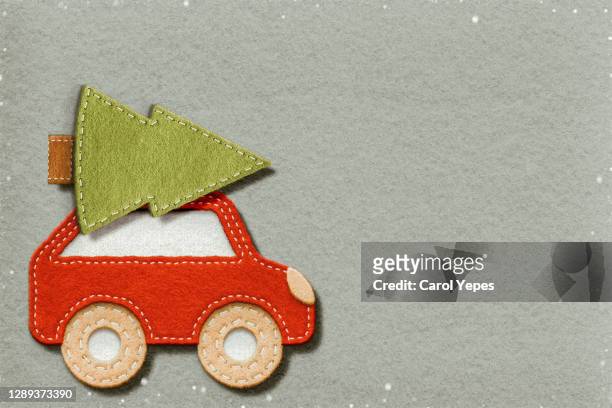 handmade craft of felt textile of red car wearing christmas tree - blue felt stock pictures, royalty-free photos & images