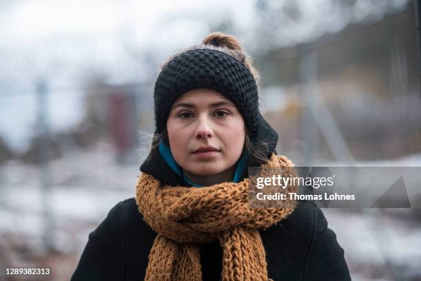 Fridays for Future activist Luisa Neubauer attents a performance of pinanist Igor Levit playing a piano set up at the construction site of the A49...