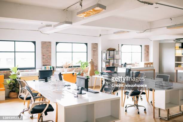 interior of open office space - small office stock pictures, royalty-free photos & images