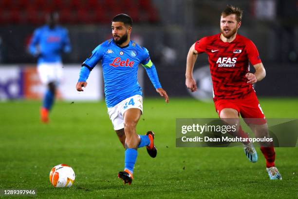 Lorenzo Insigne of Napoli gets past the tackle from Fredrik Midtsjo of AZ Alkmaar during the UEFA Europa League Group F stage match between AZ...