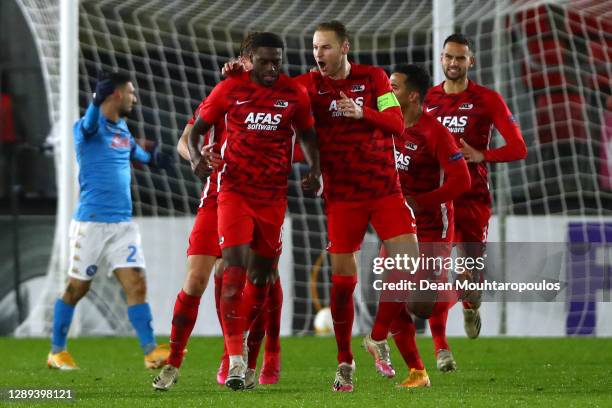 Bruno Martins Indi of AZ Alkmaar celebrates scoring his teams first goal of the game with team mates during the UEFA Europa League Group F stage...