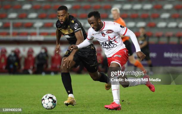 Fabrice Olinga of Mouscron battles for the ball with Duckens Nazon of STVV during the Jupiler Pro League match between Royal Excel Mouscron and STVV...