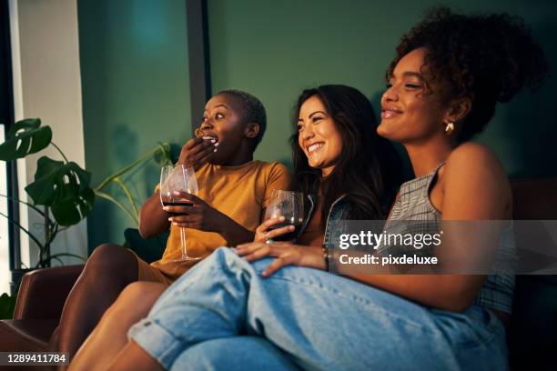 watching a good comedy with my squad - ladies night stock pictures, royalty-free photos & images