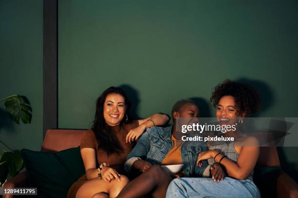 enjoying a night in with the squad - night in stock pictures, royalty-free photos & images