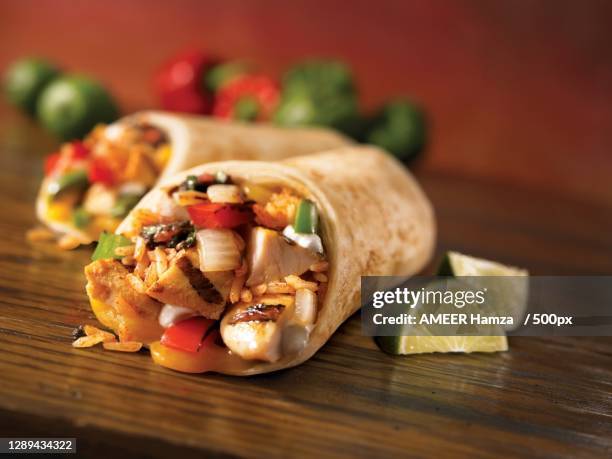 close-up of food on cutting board - tortilla flatbread stock pictures, royalty-free photos & images