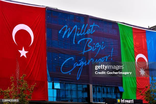 Turkish and Azerbaijani national flags are displayed on the facade of the opposition IYI Party's headquarters building on September 20, 2020 in...