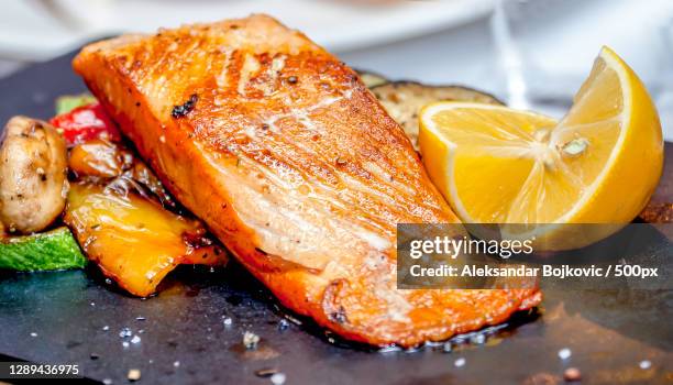 close-up of fish on table,belgrade,serbia - zalm gerecht stockfoto's en -beelden