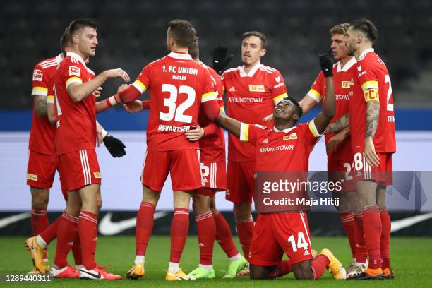 Taiwo Awoniyi of Union celebrates his team's first goal with teammates during the Bundesliga match between Hertha BSC and 1. FC Union Berlin at...