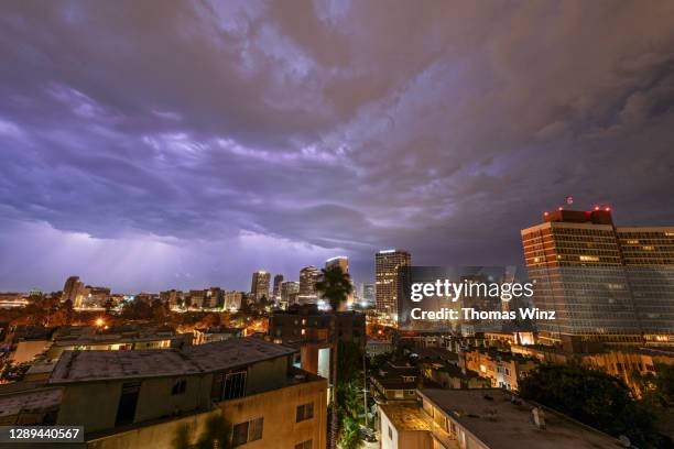 lightning storm over oakland at night - oakland california night stock pictures, royalty-free photos & images