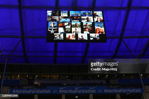 Pictures of fans of Hertha are shown on a screen prior to the Bundesliga match between Hertha BSC and 1. FC Union Berlin at Olympiastadion on...