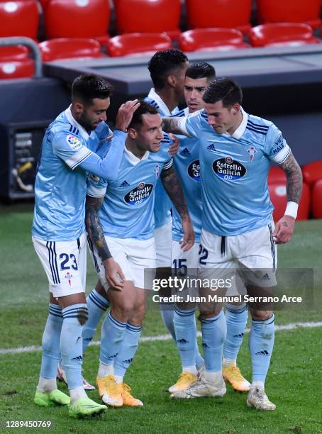 Hugo Mallo of Celta de Vigo celebrates his team's first goal with teammates during the La Liga Santander match between Athletic Club and RC Celta at...