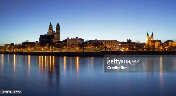 magdeburg skyline at blue hour (saxony-anhalt, germany) - magdeburg stock pictures, royalty-free photos & images